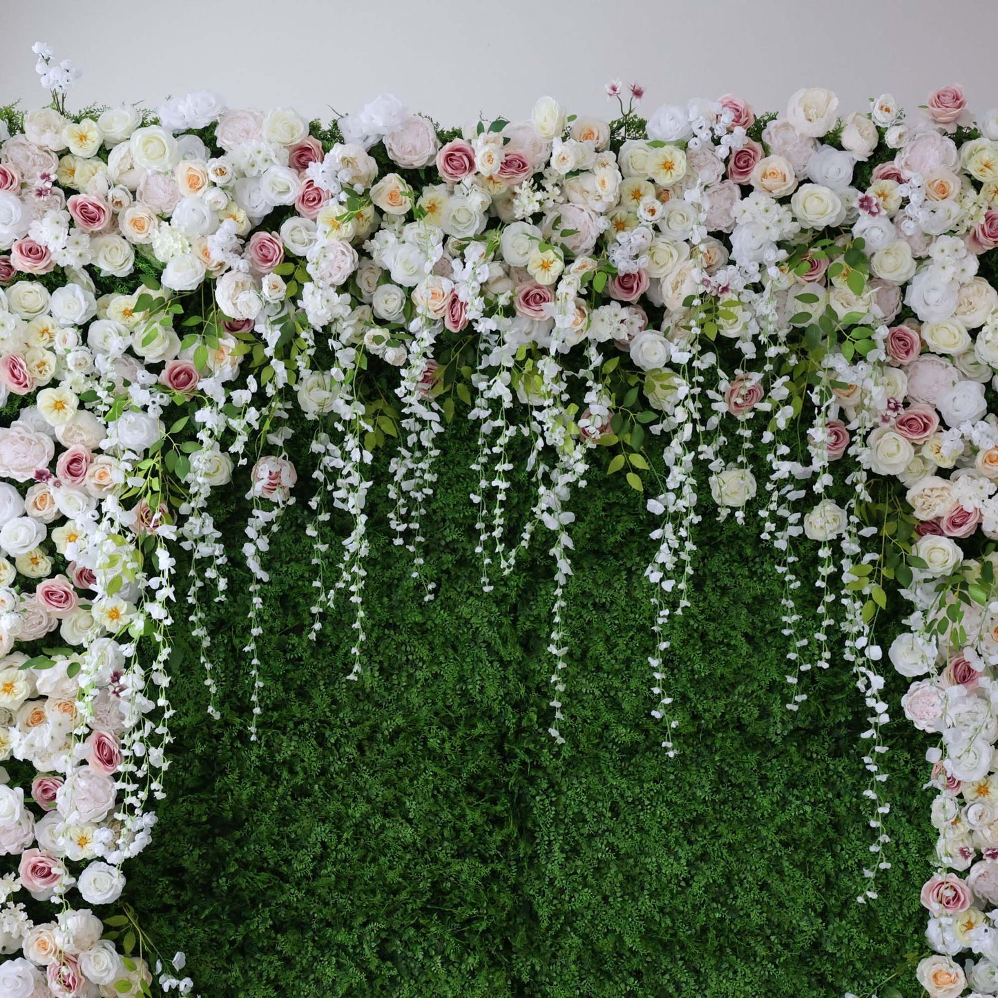 ValarFlowers white pink rose flower wall backdrop with greenery and cascading wisteria for wedding venue decoration