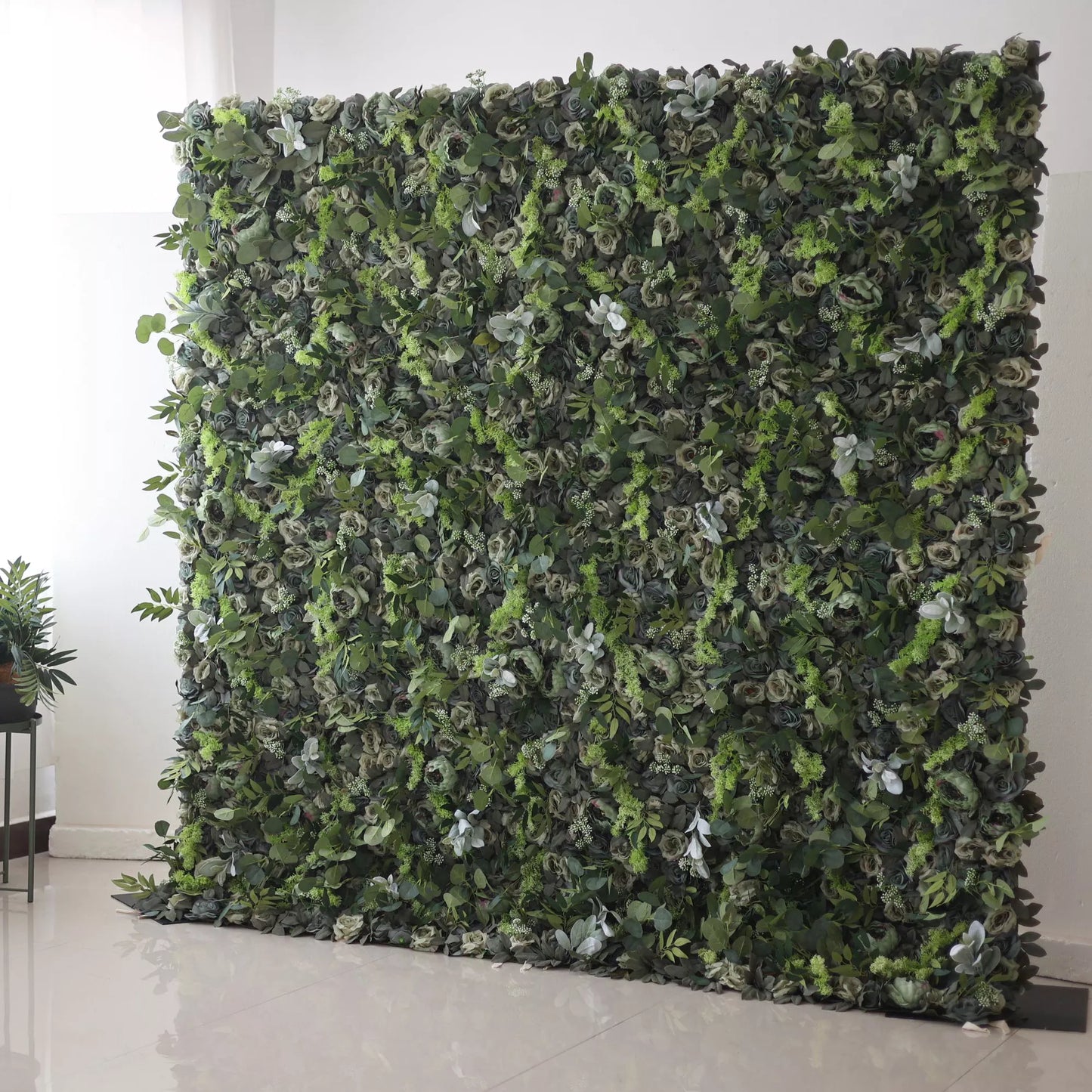 Valar Flowers' Enchanted Forest: This is a large artificial greenery wall. It features a dense mix of various green leaves and small foliage, creating a lush, natural - looking texture. The different shades of green and varied leaf shapes give it a rich, verdant appearance, perfect for adding an earthy, refreshing backdrop to spaces. 