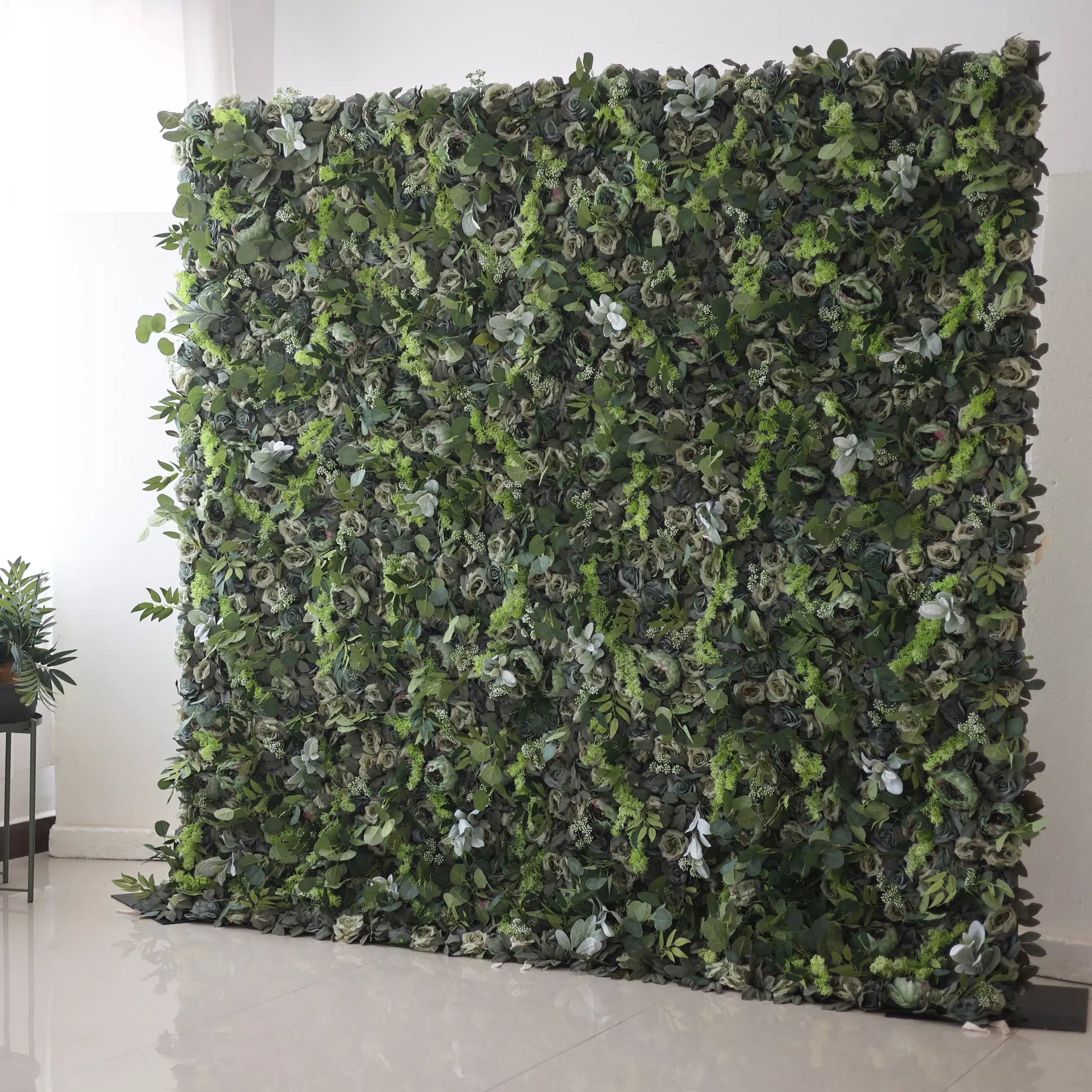 Valar Flowers' Enchanted Forest: This is a large artificial greenery wall. It features a dense mix of various green leaves and small foliage, creating a lush, natural - looking texture. The different shades of green and varied leaf shapes give it a rich, verdant appearance, perfect for adding an earthy, refreshing backdrop to spaces. 