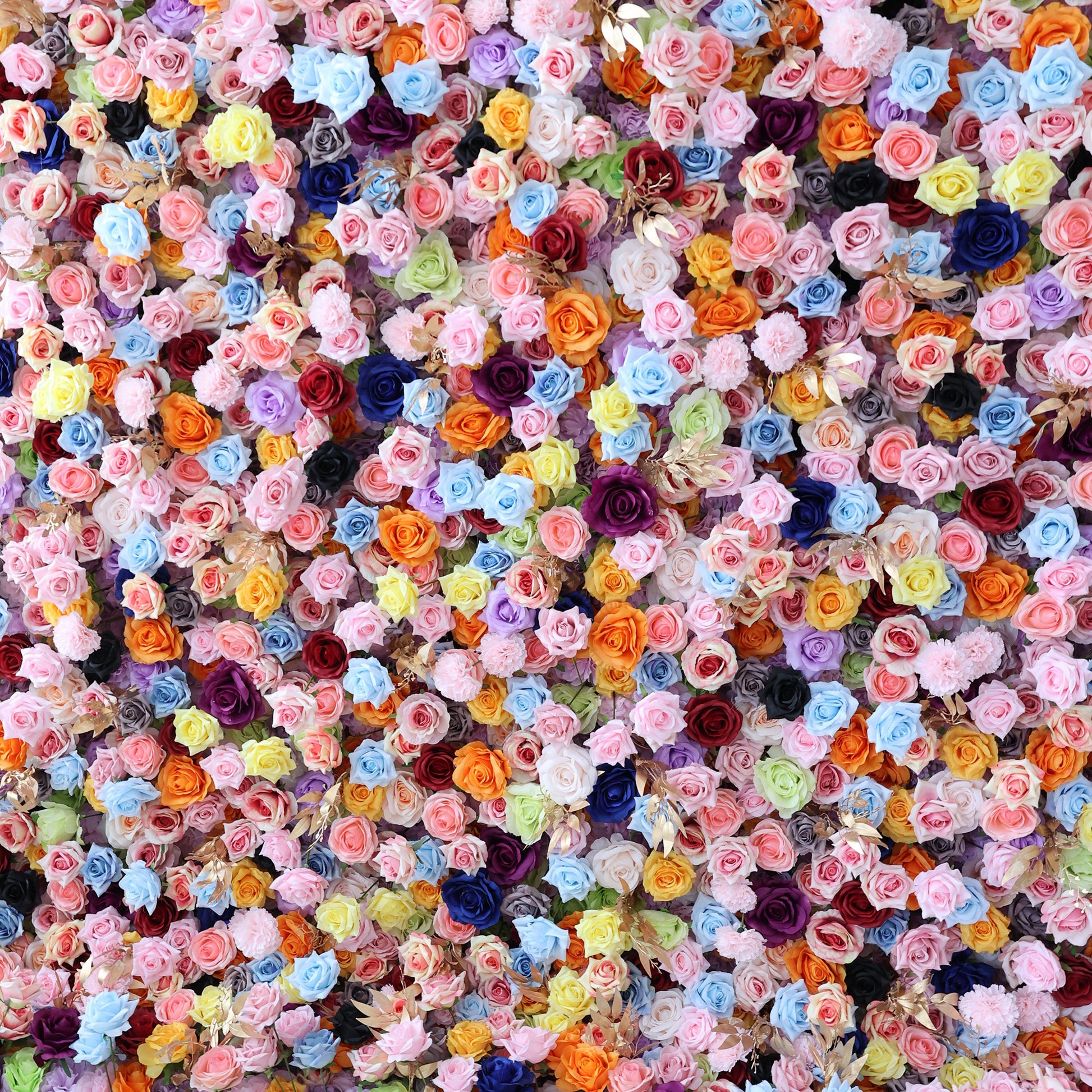 This image showcases a dense, vibrant floral wall composed of an array of artificial flowers. It features roses and other blooms in a stunning spectrum of colors, including pink, blue, orange, yellow, purple, and more. The flowers are densely packed, creating a lush, colorful, and visually striking display that exudes a sense of natural beauty and charm, perfect for decorative purposes in events or as a striking artistic installation.