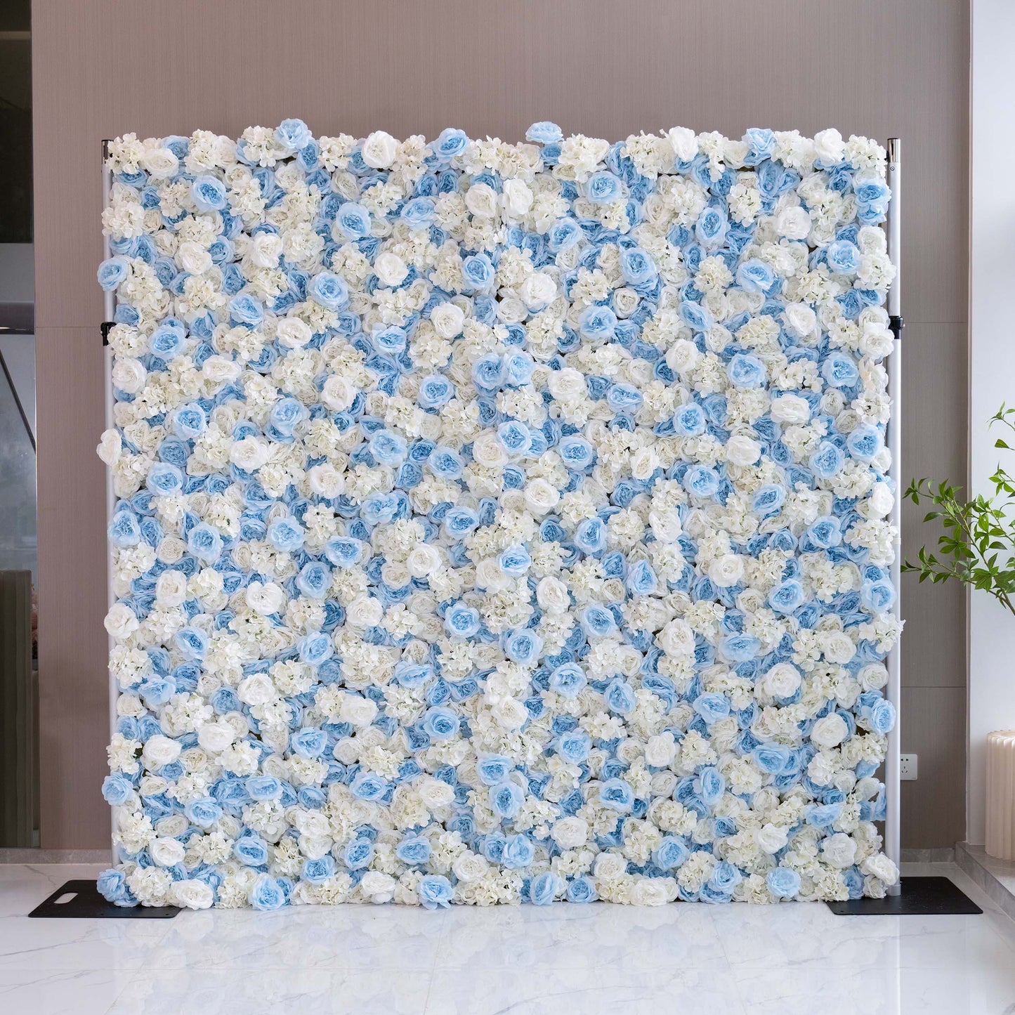 ValarFlowers' artificial flower wall is a wedding essential. It features realistic blooms in various colors, creating a romantic and elegant backdrop. Perfect for capturing beautiful wedding memories.