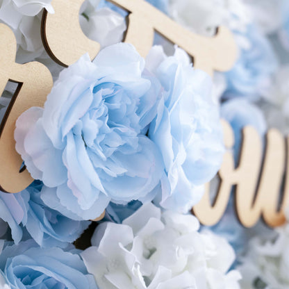 The ValarFlowers artificial flower wall is perfect for weddings. It features a beautiful blend of blue and white flowers, creating a romantic and elegant backdrop for the special day.