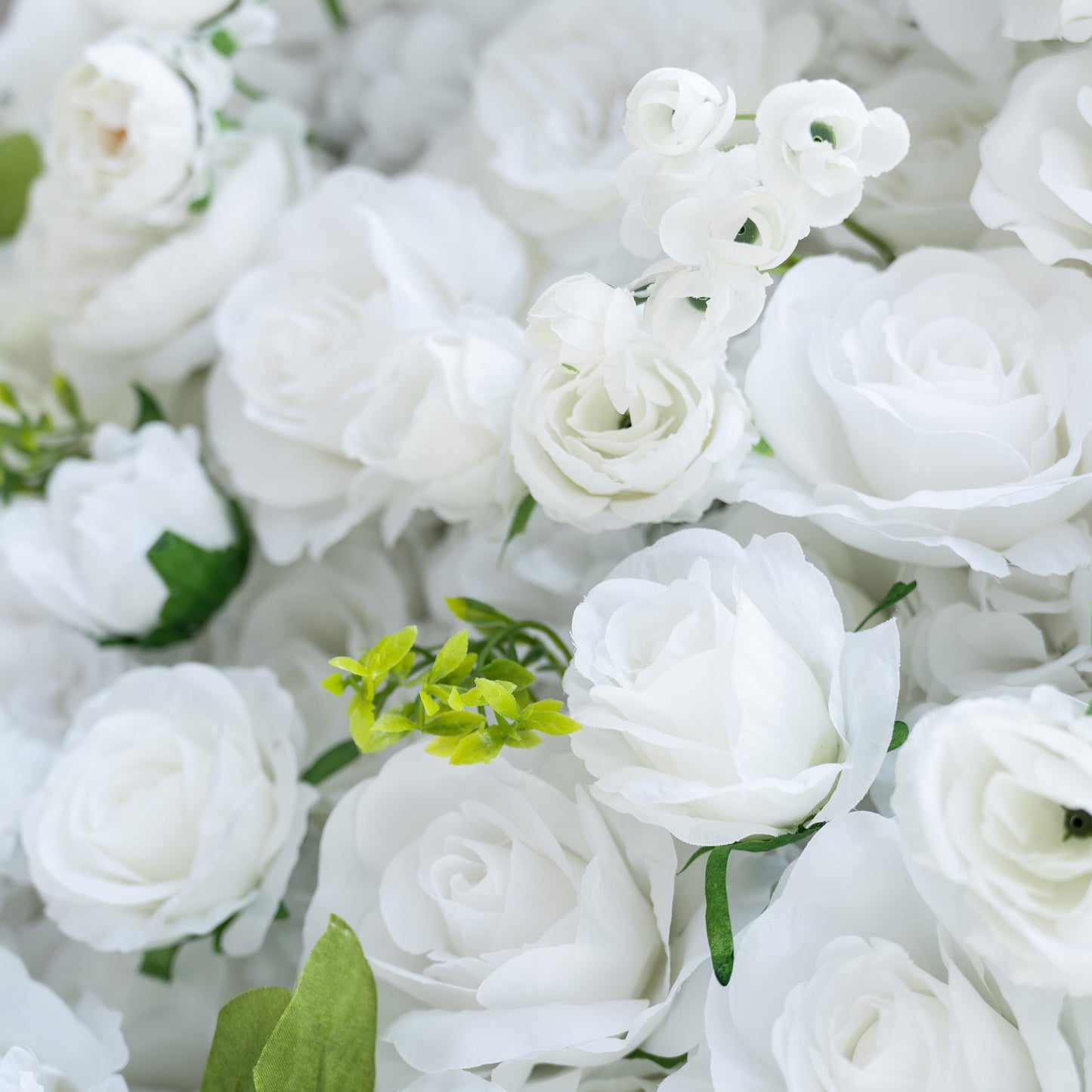 This backdrop showcases a lush arrangement of artificial white roses and other small white blooms, interspersed with green leaves. The all - white color with green accents gives it an elegant and pure look.

It is suitable for weddings, symbolizing purity and new beginnings; bridal and baby showers, enhancing the celebratory and delicate atmosphere; and corporate events to add a touch of sophistication. 