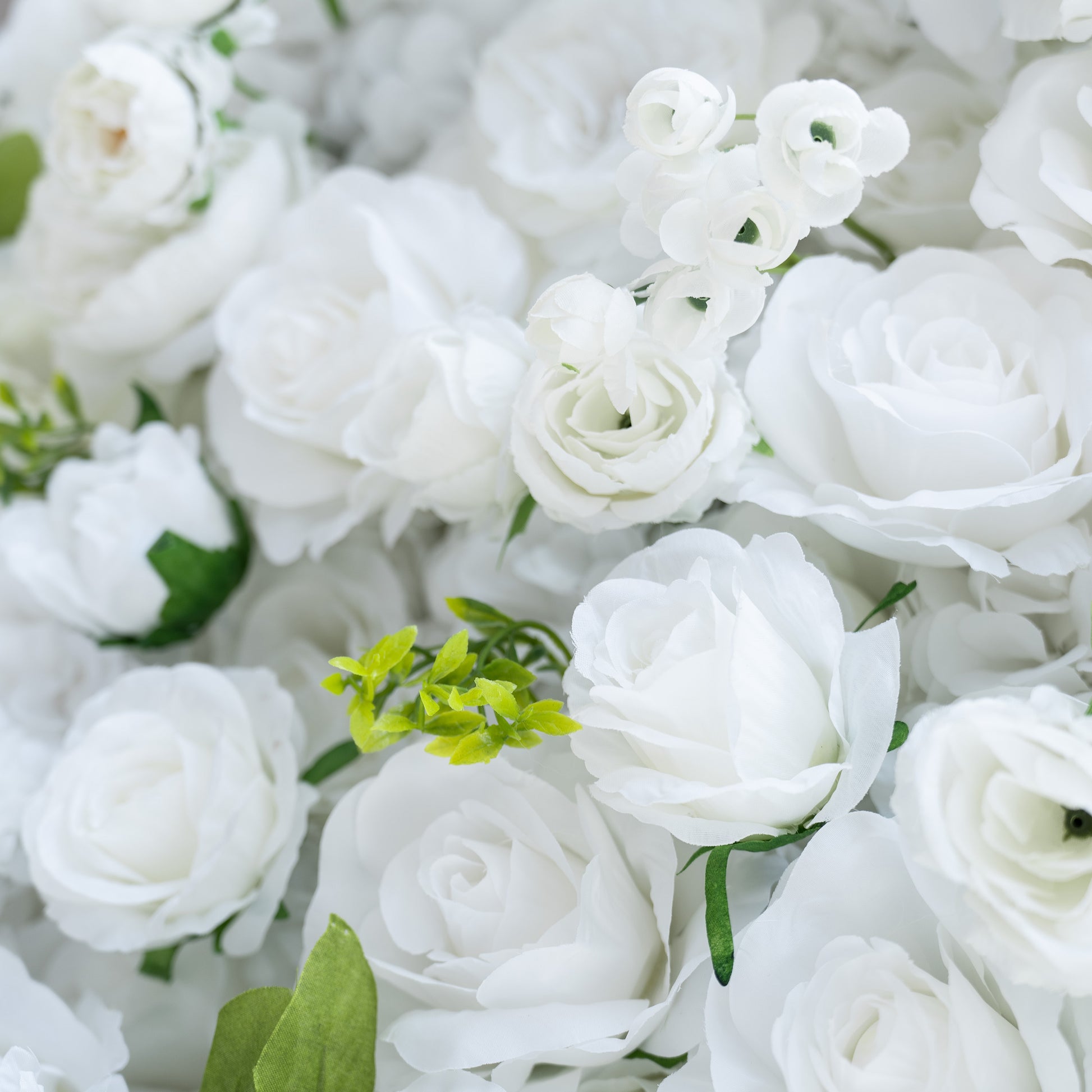 This backdrop showcases a lush arrangement of artificial white roses and other small white blooms, interspersed with green leaves. The all - white color with green accents gives it an elegant and pure look.

It is suitable for weddings, symbolizing purity and new beginnings; bridal and baby showers, enhancing the celebratory and delicate atmosphere; and corporate events to add a touch of sophistication. 