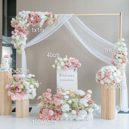 The measurements in the image are as follows:
- Arch corner floral arrangement: 1x1m
- Side of the vertical floral arrangement on the arch: 1m
- Base floral arrangement in front of the sign: 100x40cm 
- Left - side vase floral arrangement: 80x50cm
- Right - side vase floral arrangement: 50x50cm 
- Width of the sign: 40cm 