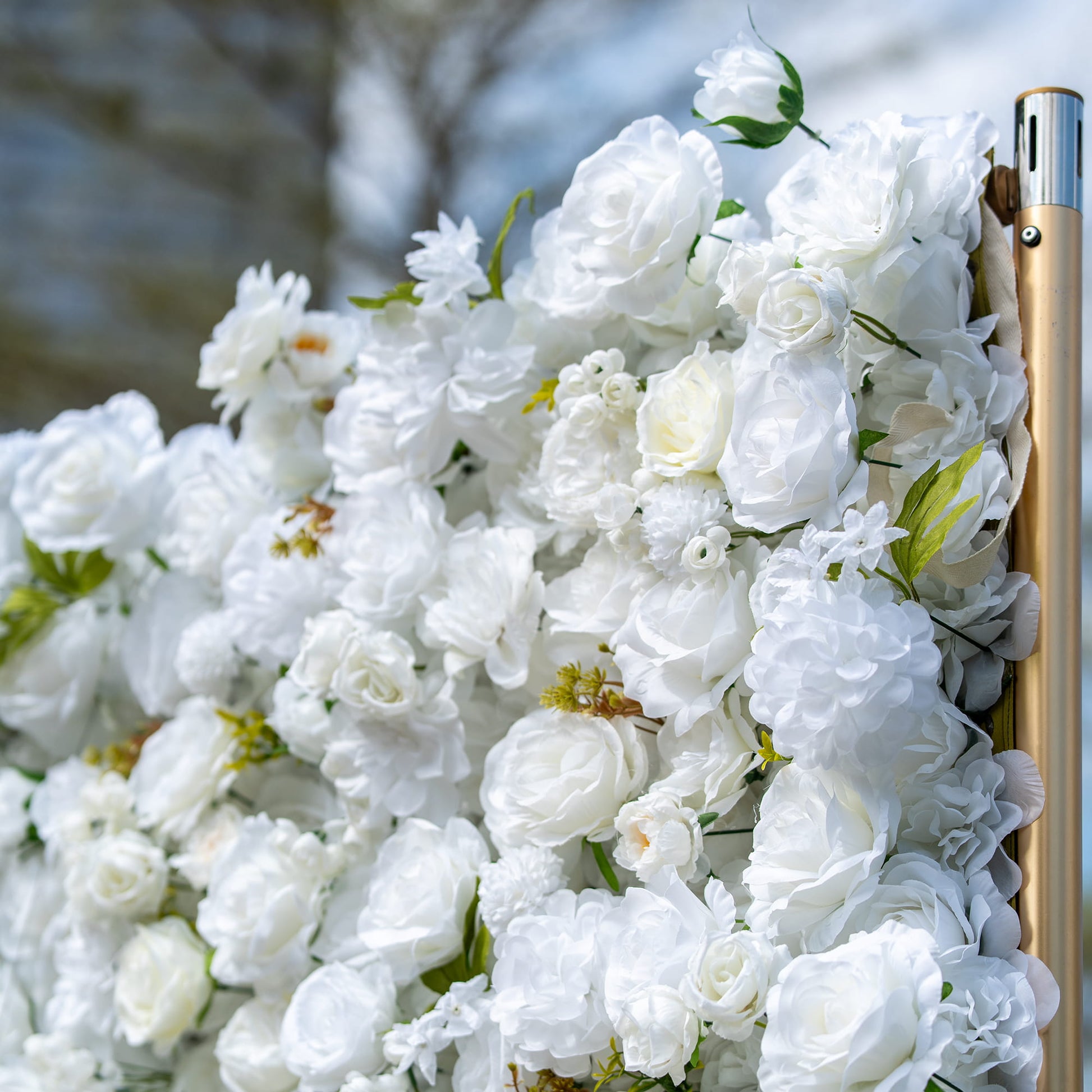 This backdrop features a dense cluster of artificial white flowers, mainly roses, along with various smaller blooms and green leaves. The all - white color palette with green accents creates an elegant and pure aesthetic.

It is ideal for weddings, symbolizing purity and love; bridal and baby showers, adding a delicate and celebratory touch; and corporate events, providing a sophisticated backdrop. 