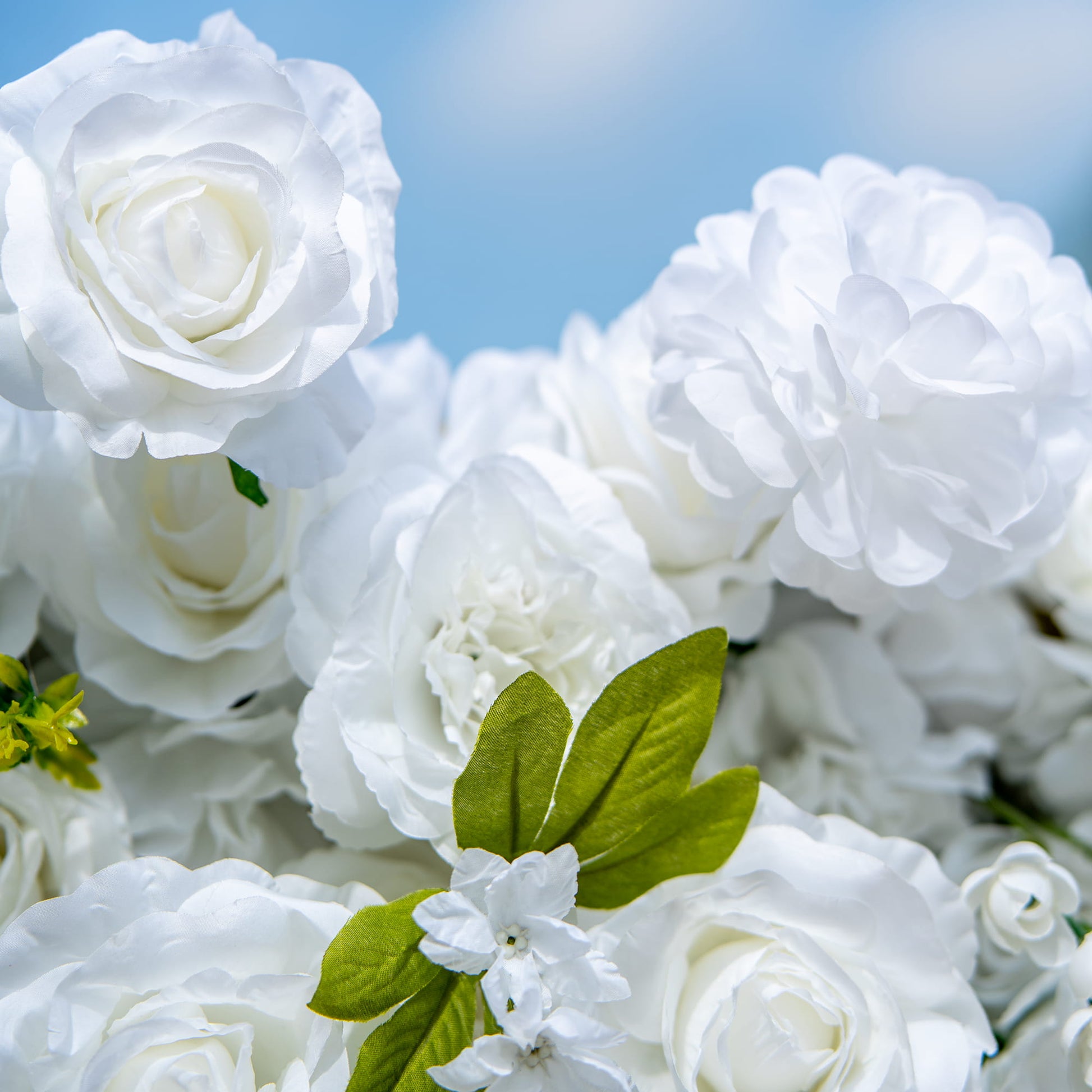 This backdrop features a rich arrangement of artificial white roses and other white blooms, complemented by vibrant green leaves. The all - white color scheme with green accents creates an elegant and fresh look.

It is suitable for weddings, symbolizing purity and new beginnings; bridal and baby showers, adding a delicate and celebratory touch; and corporate events, providing a sophisticated and refined atmosphere. 