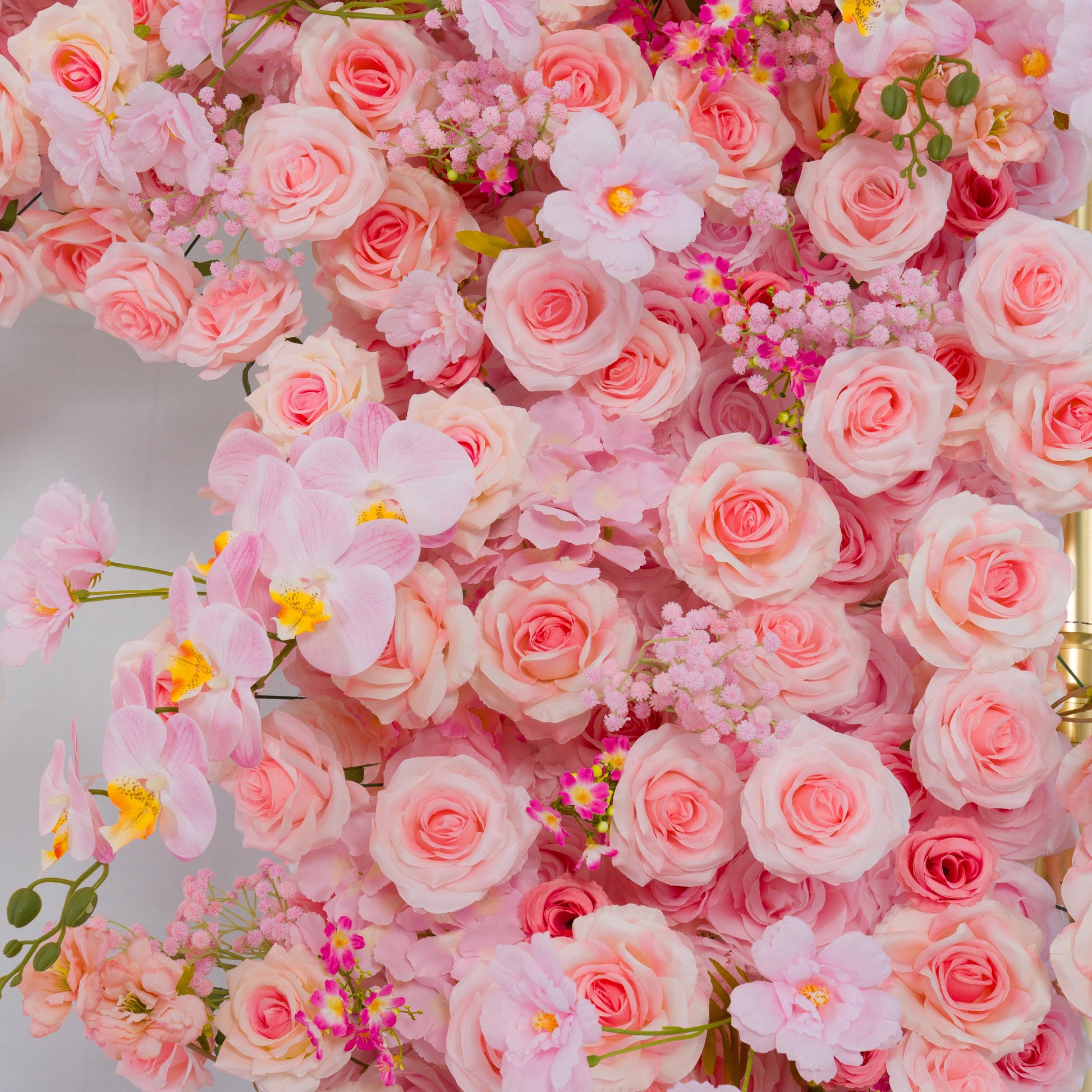 This backdrop features a rich tapestry of artificial flowers. Predominant are various shades of pink roses, with their classic, tightly - wound centers and delicate petals. Interspersed are light - pink orchids with vibrant yellow centers, along with small clusters of pink filler flowers.

The color palette ranges from soft pastels to slightly deeper pinks, creating a harmonious and romantic look. The overall style is elegant and dreamy, making it an ideal choice for romantic events like proposals, weddings
