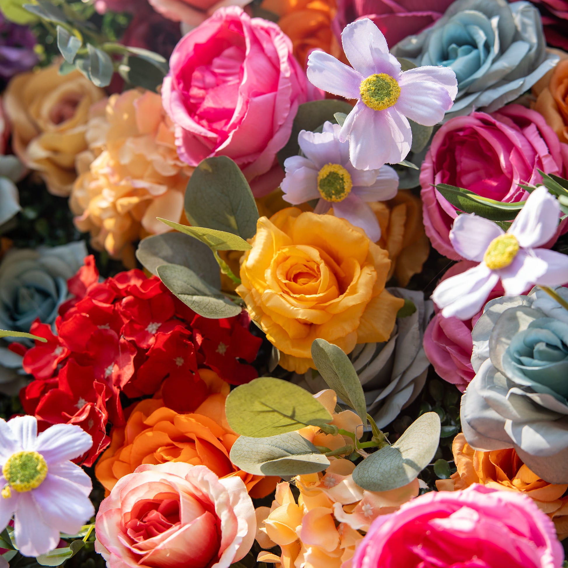 This backdrop showcases a vibrant medley of colors like pink, orange, yellow, red, purple, and blue. It features an assortment of roses and small daisy - like flowers. Ideal for lively events such as outdoor parties, weddings, and festivals. 