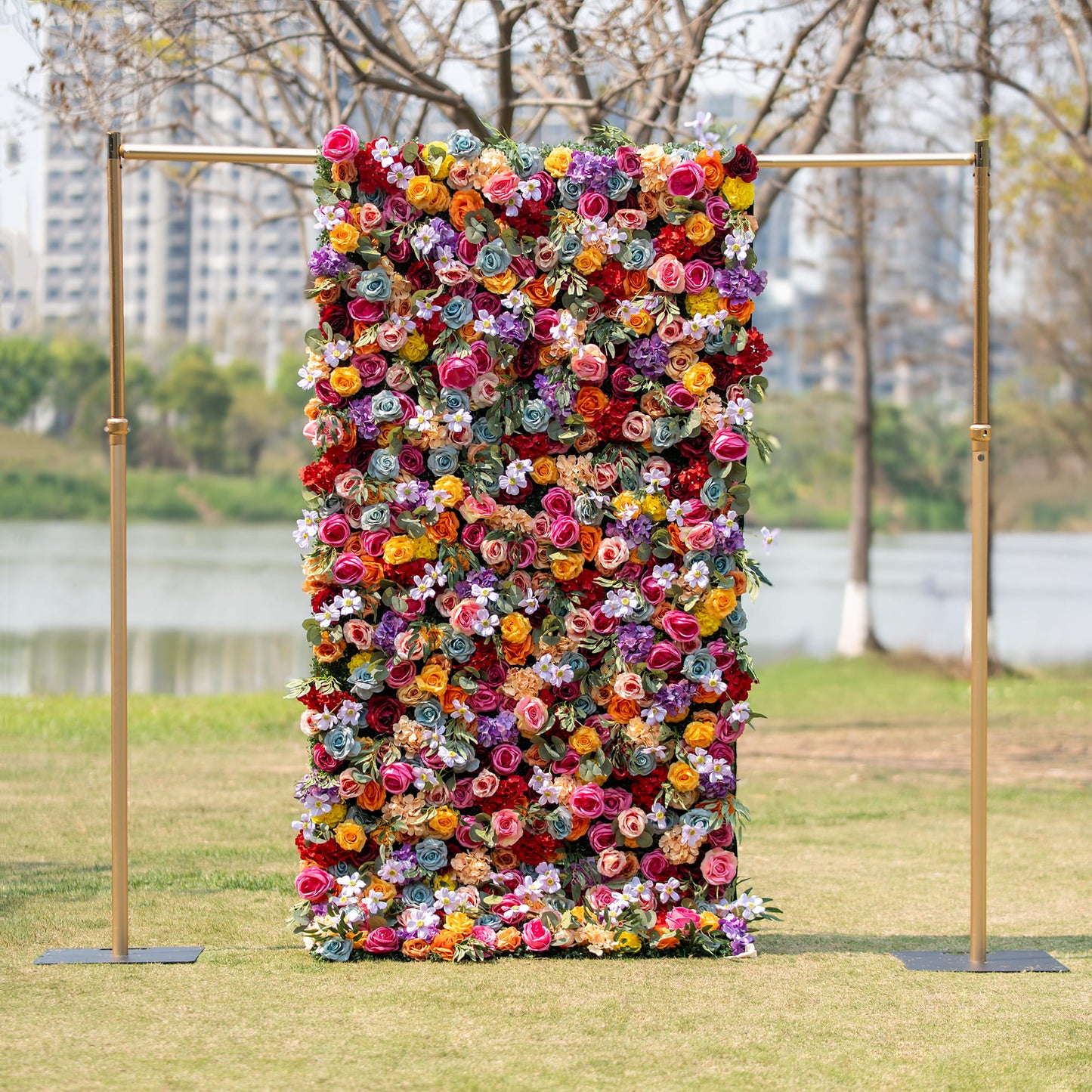 This backdrop showcases a vivid spectrum of colors including pink, orange, yellow, red, purple, and blue. It is densely adorned with roses and small daisy - like flowers. Ideal for festive outdoor events such as weddings, garden parties, and celebratory galas. 