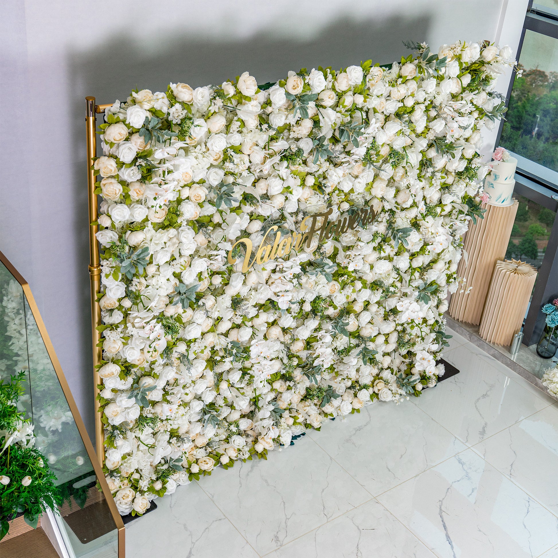 This backdrop is a lush arrangement of white roses, peonies, and orchids, interspersed with green foliage. With a white - green color theme, it exudes elegance, making it perfect for weddings, bridal showers, or upscale events. The “Valar Flowers” sign adds a touch of branding. 