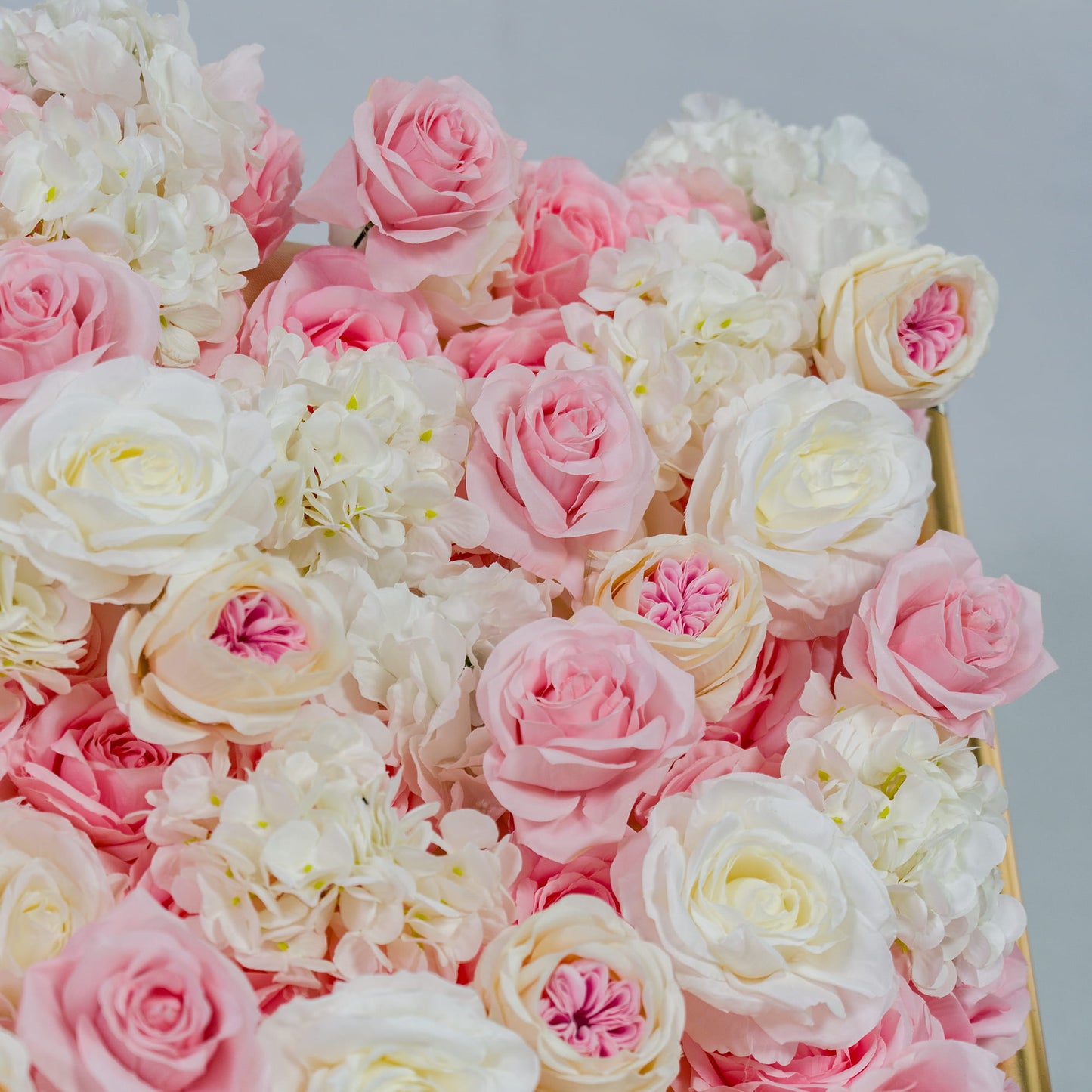 This photo captures a close - up of a lush floral arrangement. It features a mix of pink and white roses, along with white hydrangeas. The soft pastel colors create a romantic and elegant look. Ideal for weddings, bridal showers, or other romantic events, this backdrop exudes a dreamy and sophisticated style, making it perfect for adding a touch of romance to any occasion. 