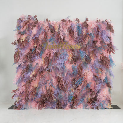 This backdrop is a lush, colorful foliage arrangement. It features a blend of pink, purple, and brown leaves, with some blue fern - like fronds adding contrast. The elegant &quot;Valar Flowers&quot; sign in gold lettering stands out amidst the greenery. Ideal for weddings, parties, or upscale events, it exudes a romantic and sophisticated style. 