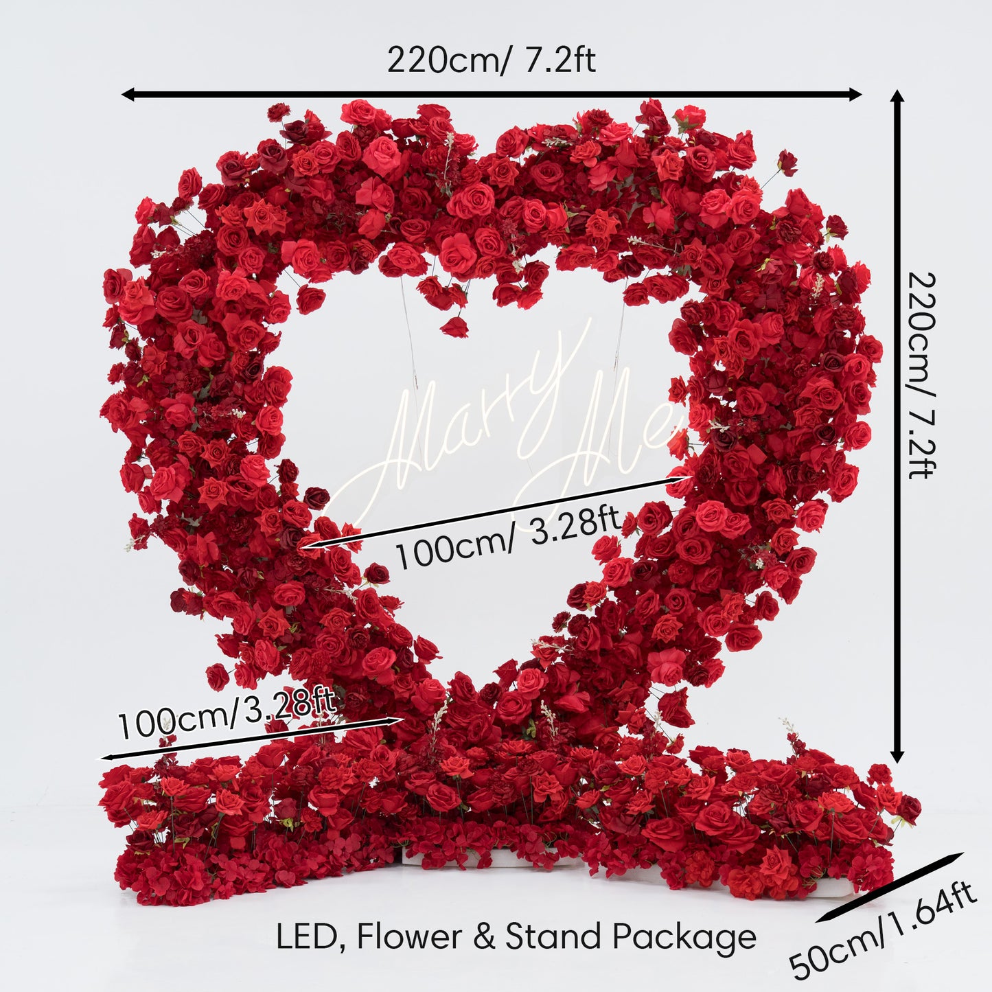 This is a large - scale decorative flower arrangement. Shaped like a heart with a base, it's made of red flowers. The center has a "Marry Me" LED sign. Dimensions: 220cm (7.2ft) in height and width, with detailed size markers. It's an LED, flower, and stand package, ideal for marriage proposals or romantic events. 