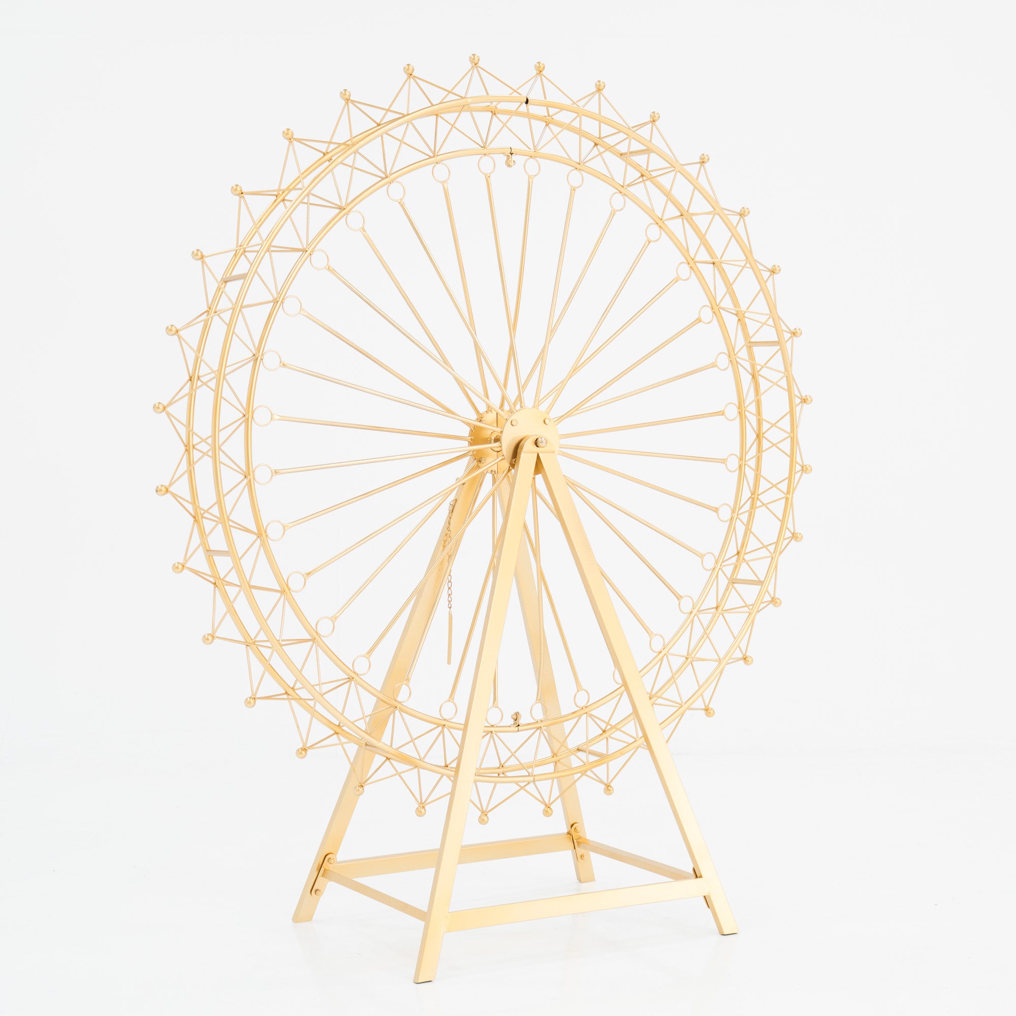 A golden metal Ferris wheel decoration with an open, intricate lattice design. It features a triangular stand and circular spokes, creating a delicate, ornamental structure. The shimmering gold finish adds elegance, perfect for decorative event setups. 
