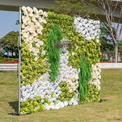 This premium artificial flower wall backdrop by Valar Flowers features a lush, nature-inspired design with vibrant green hydrangeas, crisp white blooms, soft ivory roses, and cascading green foliage, accented by the custom "ValarFlowers" logo. Reusable and maintenance-free, it creates a fresh, elegant focal point ideal for outdoor weddings, garden parties, photo booths, and luxury events, offering long-lasting beauty for professional decor.