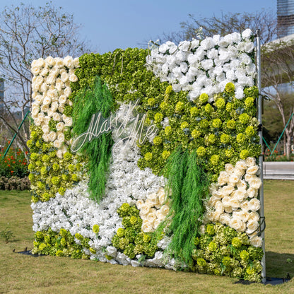 This is a stunning 10x8ft artificial flower wall backdrop by Valar Flowers, featuring a lush, nature-inspired design with vibrant green hydrangeas, cascading foliage, soft ivory roses, and crisp white blooms. Centered with a custom "Marry Me" neon sign, this reusable, maintenance-free display creates a romantic focal point, ideal for outdoor weddings, proposals, photo booths, and luxury events, offering long-lasting beauty for professional decor.
