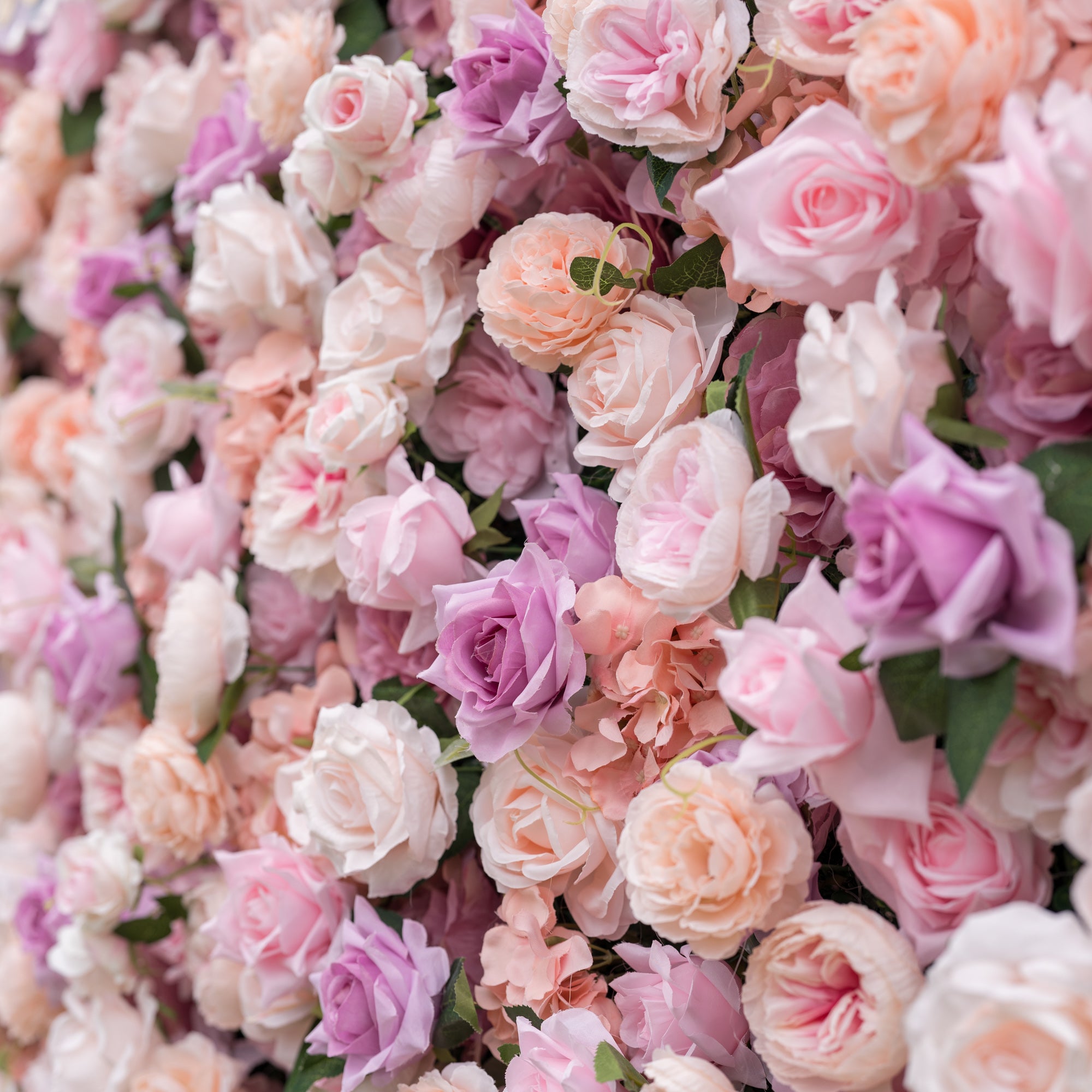 Valar Flowers wall close-up with laser-cut cursive ValerFlowers wooden sign on acrylic among blush pink dusty rose and ivory blooms with delicate texture rich layered depth and artisanal charm for rustic-chic weddings and bridal shower displays