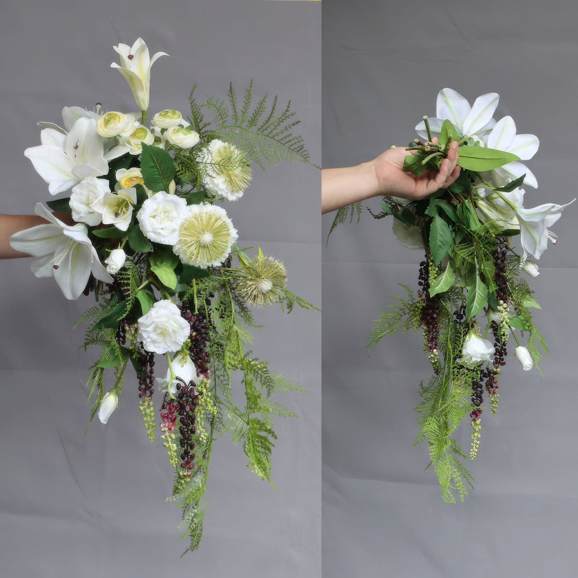 This cascading bridal bouquet features white lilies, roses, and unique spherical flowers, paired with trailing green ferns and dark berries. The flowing design blends elegance and natural charm, perfect for weddings, shown in two angles to highlight its lush, romantic structure. 