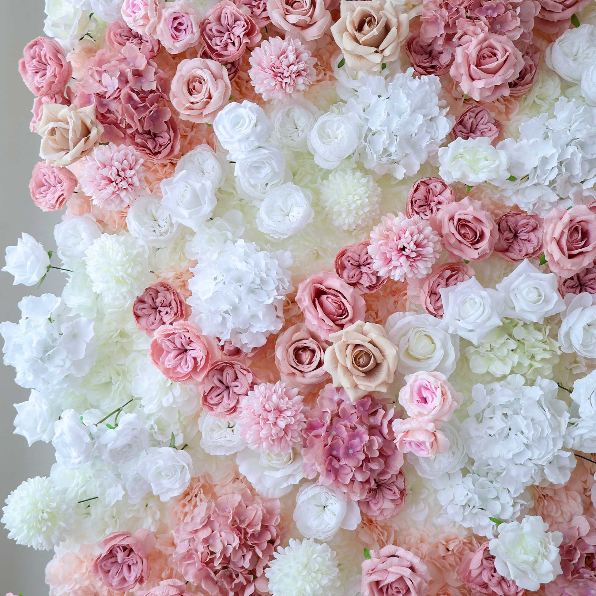 This image features a lush floral arrangement with white and soft - pink roses, hydrangeas, and other blooms, creating a romantic and elegant visual display. 