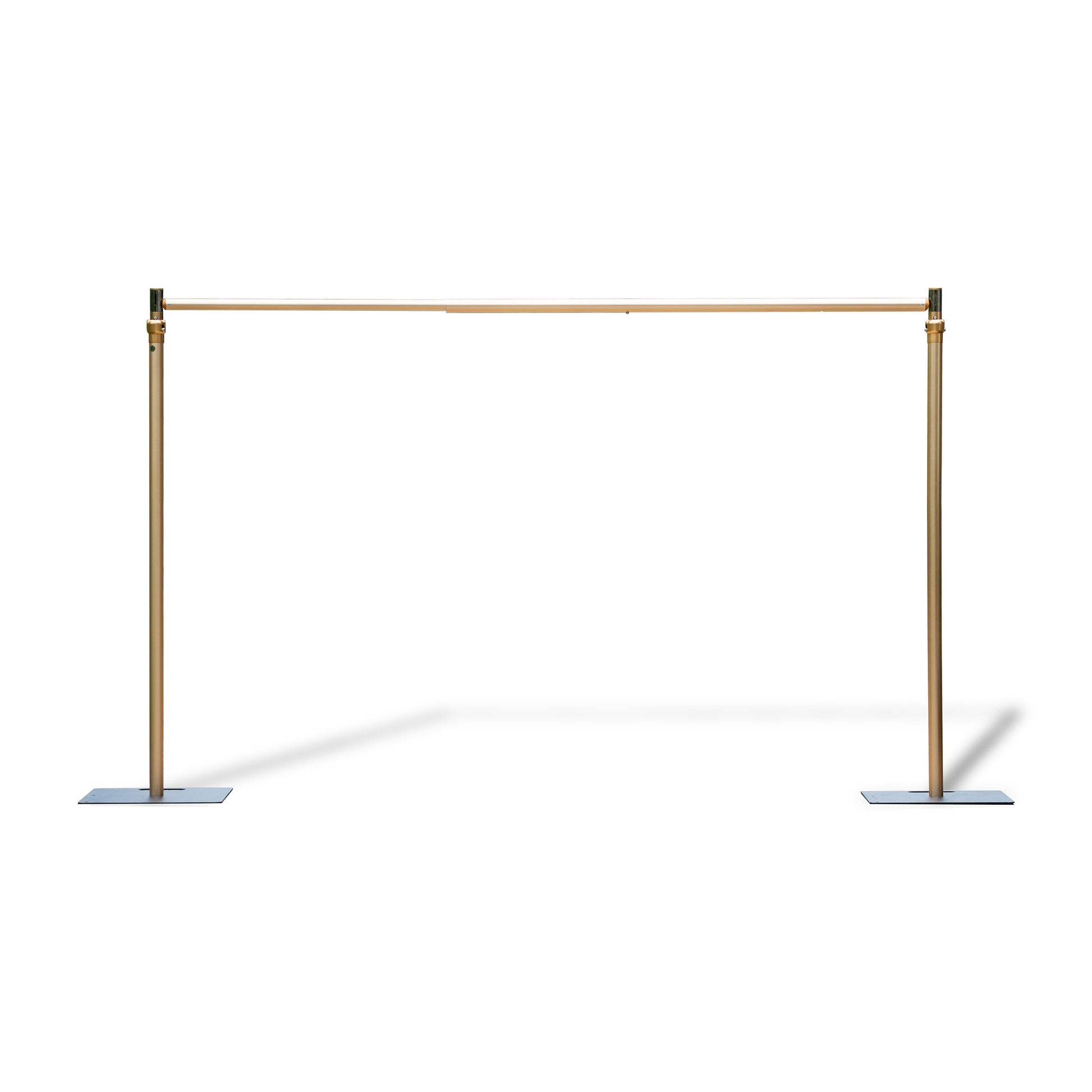 This image depicts a golden - colored backdrop stand. The stand consists of two vertical poles, each attached to a flat rectangular base for stability. A horizontal pole connects the tops of the vertical poles, forming a rectangular frame. The stand appears to be adjustable, as indicated by the connectors on the vertical poles, allowing for height modifications. It has a sleek and elegant design, suitable for various events or photography setups. 